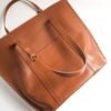 The Signature Shoulder Bag
